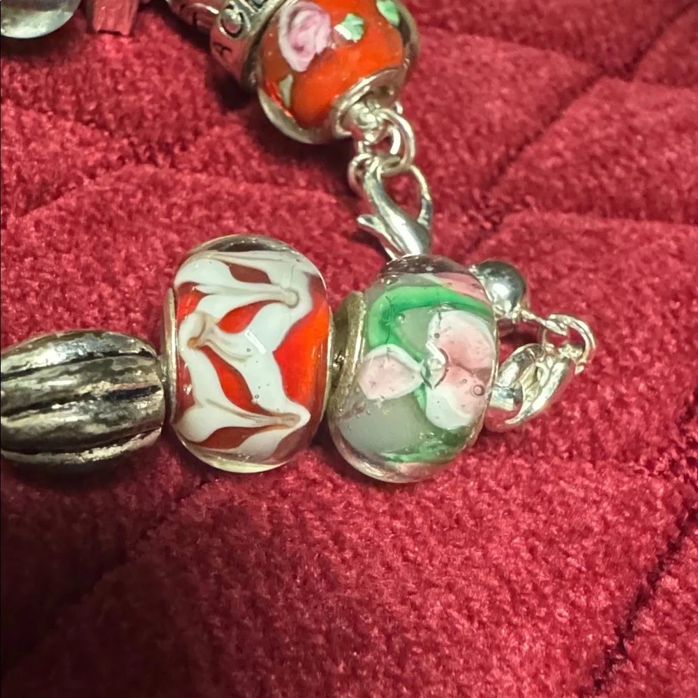 2 glass Bead and Elegant Silver Bracelets. In great condition.